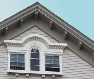Exterior of the building with an arched window