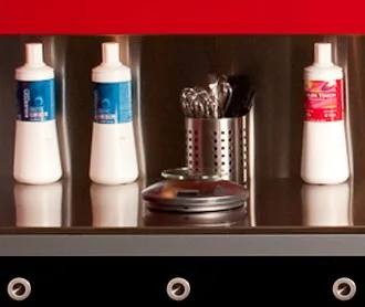 Professional color bottles and tools at the color station